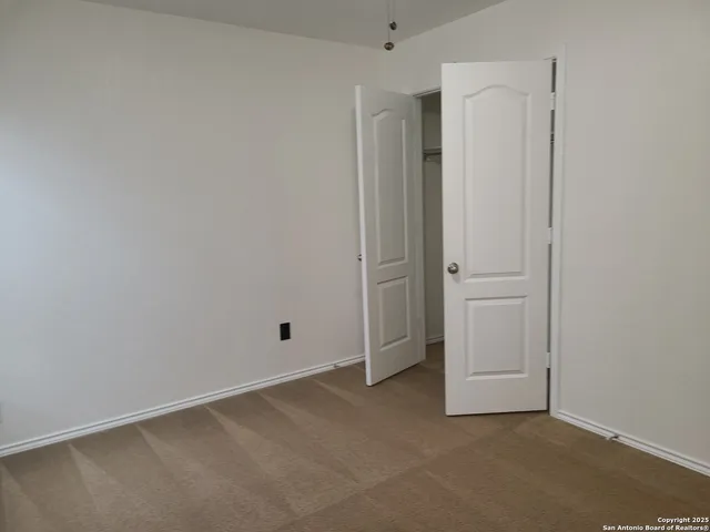a view of a livingroom with wooden floor