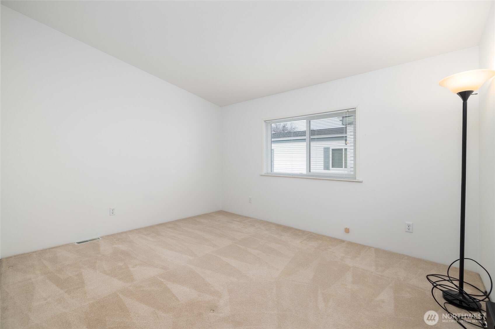 2610 East Section Street, Unit 112 Mount Vernon, WA 98274 - Photo 21 of 34 an empty room with windows