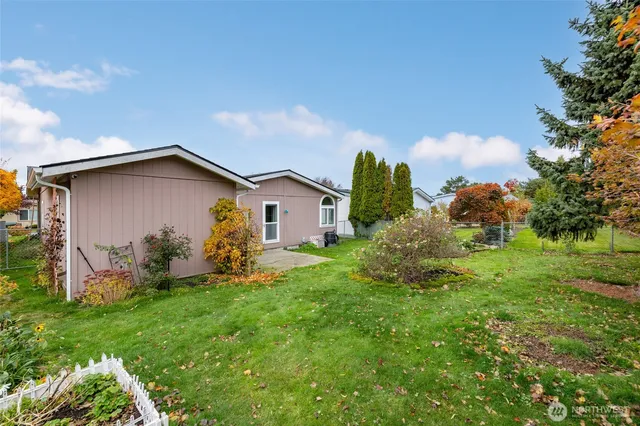 a front view of house with garden