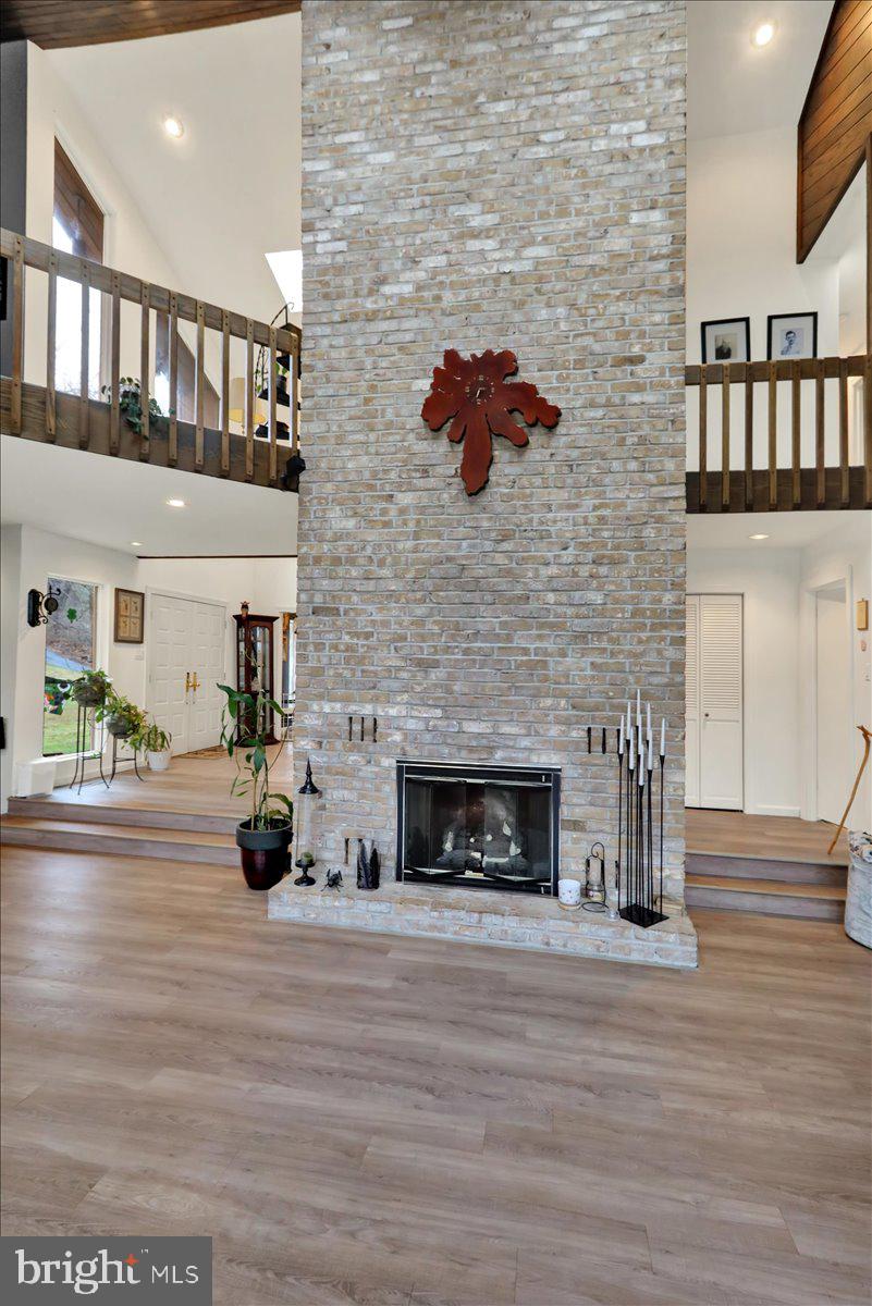 120 Deysher Road Fleetwood, PA 19522 - Photo 11 of 50 a living room with furniture wooden floor and a fireplace