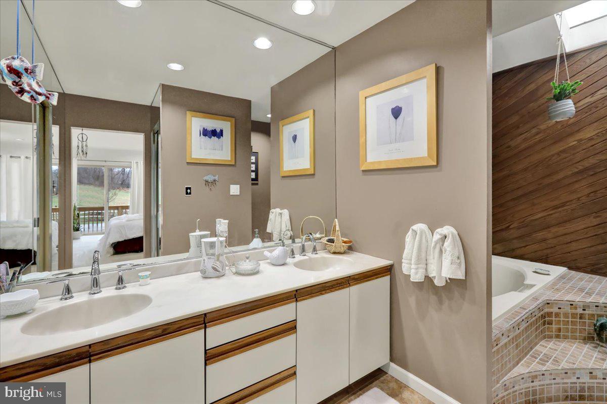 120 Deysher Road Fleetwood, PA 19522 - Photo 19 of 50 a bathroom with a double vanity sink and a mirror