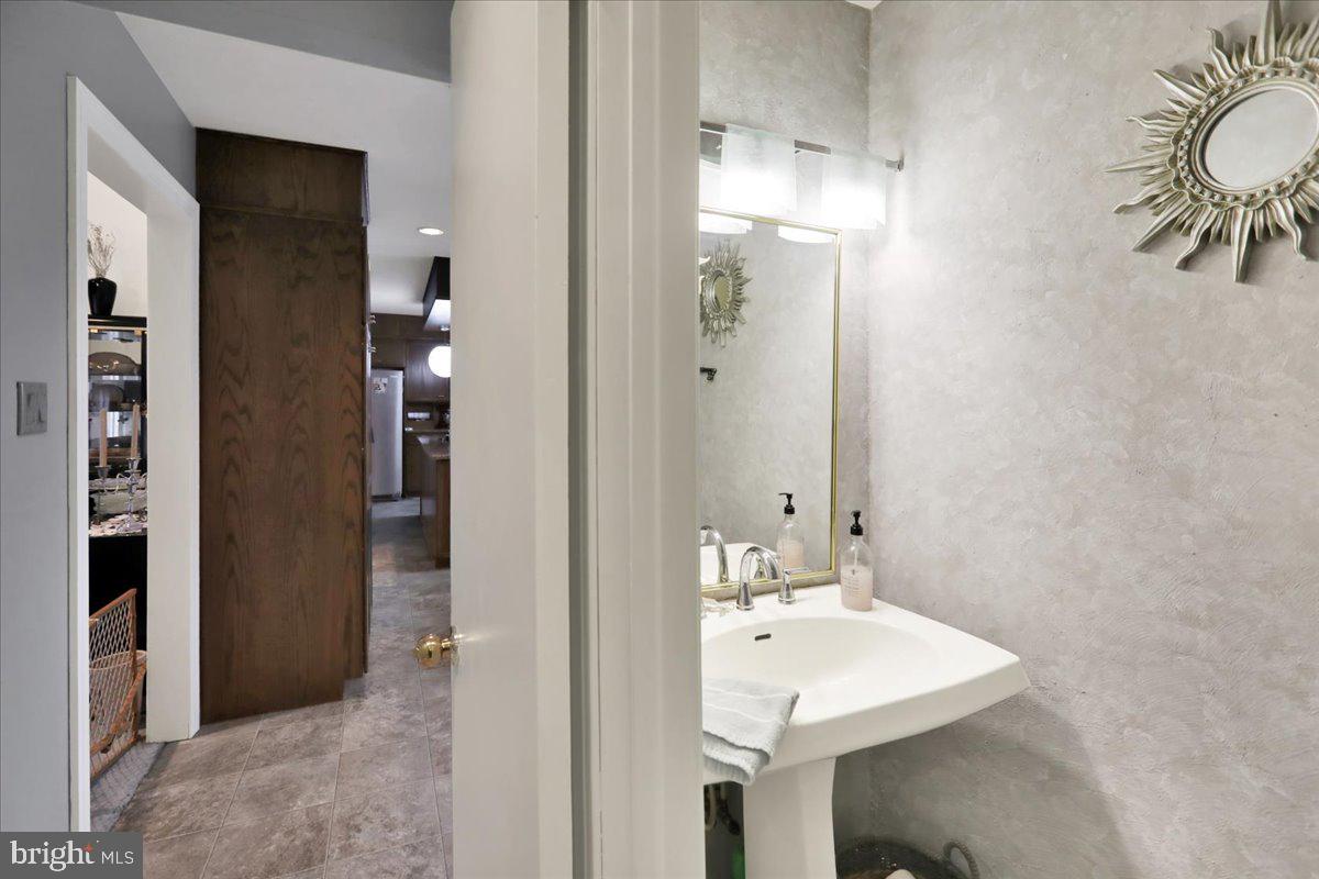 120 Deysher Road Fleetwood, PA 19522 - Photo 22 of 50 a bathroom with a sink a mirror and a shower