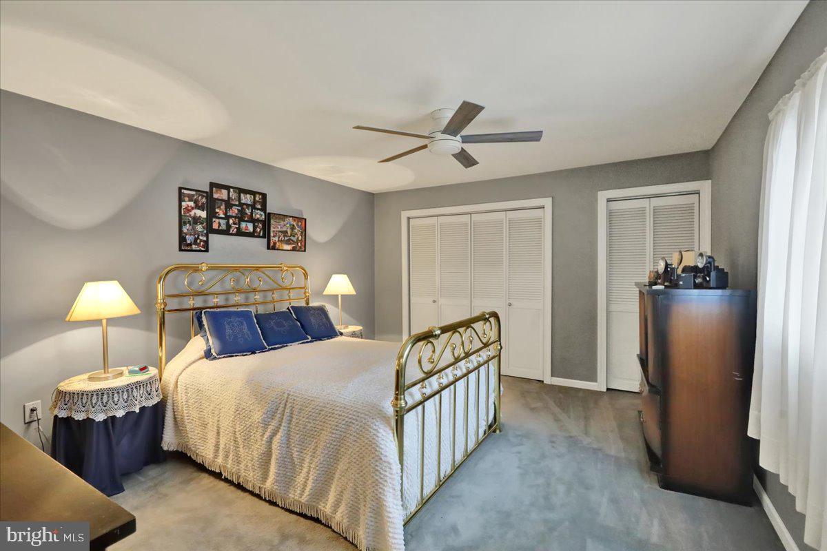 120 Deysher Road Fleetwood, PA 19522 - Photo 31 of 50 a bed room with a bed and a chandelier