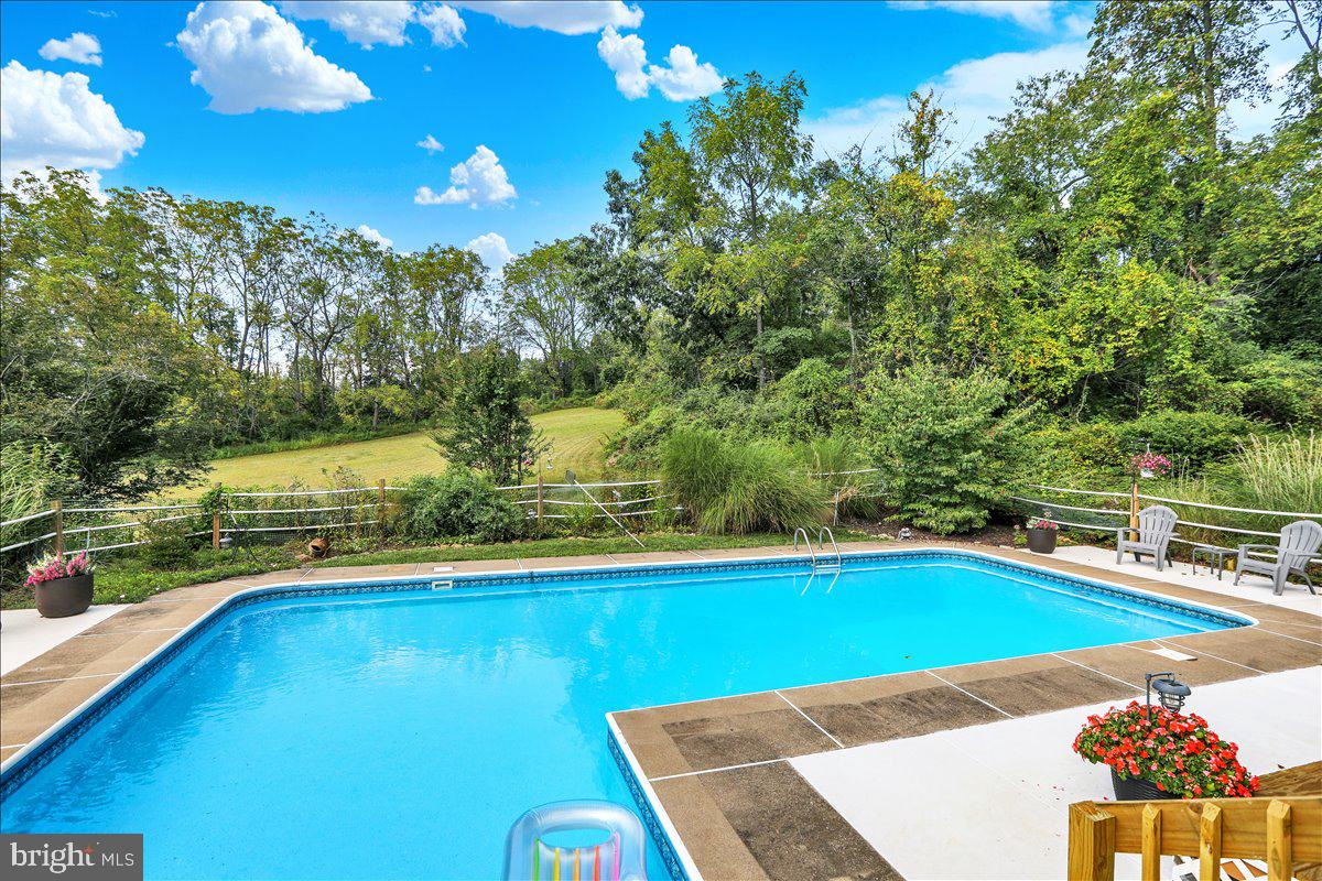 120 Deysher Road Fleetwood, PA 19522 - Photo 36 of 50 a view of a swimming pool with a yard and outdoor seating