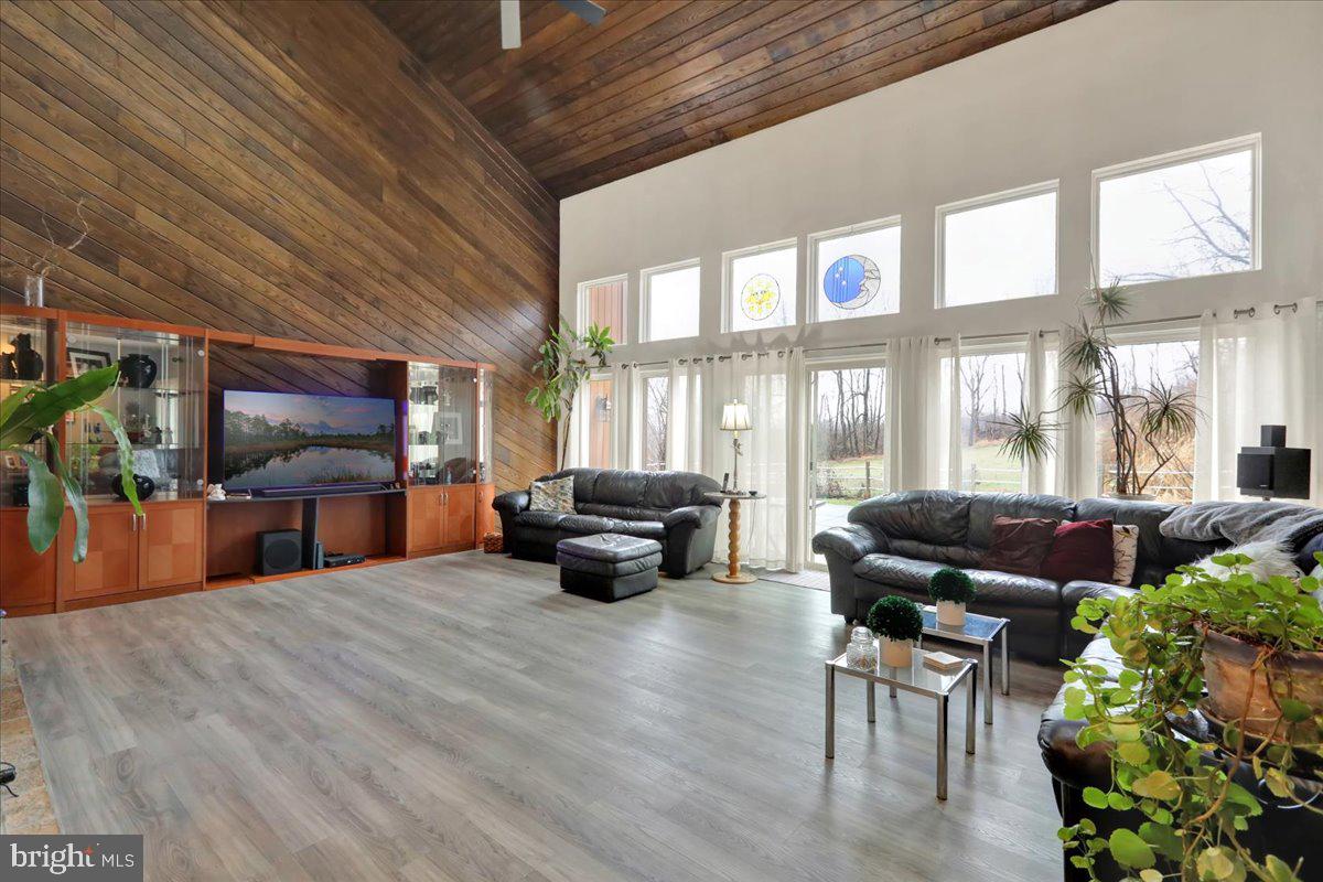 120 Deysher Road Fleetwood, PA 19522 - Photo 6 of 50 a living room with furniture and a floor to ceiling window
