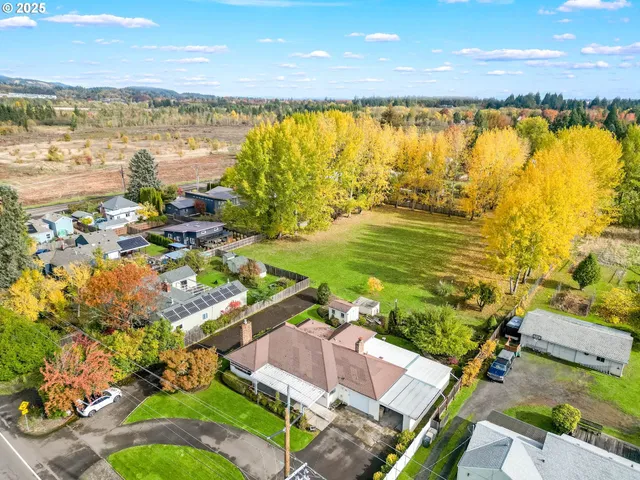 a view of a city with an ocean view