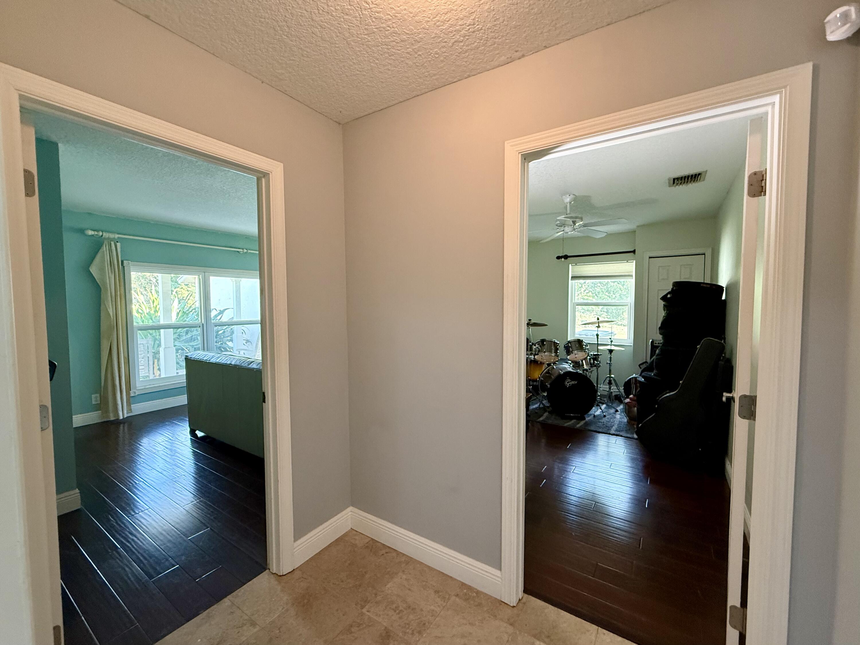 17375 173rd Road North Jupiter, FL 33478 - Photo 53 of 77 HALLWAY TO 4TH BEDROOM AND DEN