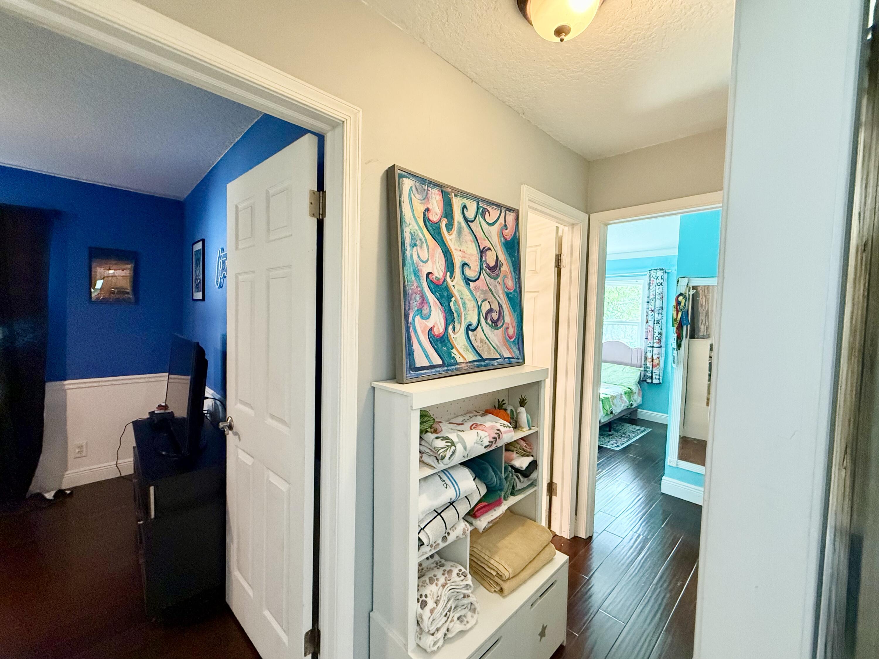 17375 173rd Road North Jupiter, FL 33478 - Photo 54 of 77 HALLWAY TO BEDROOMS 2 & 3