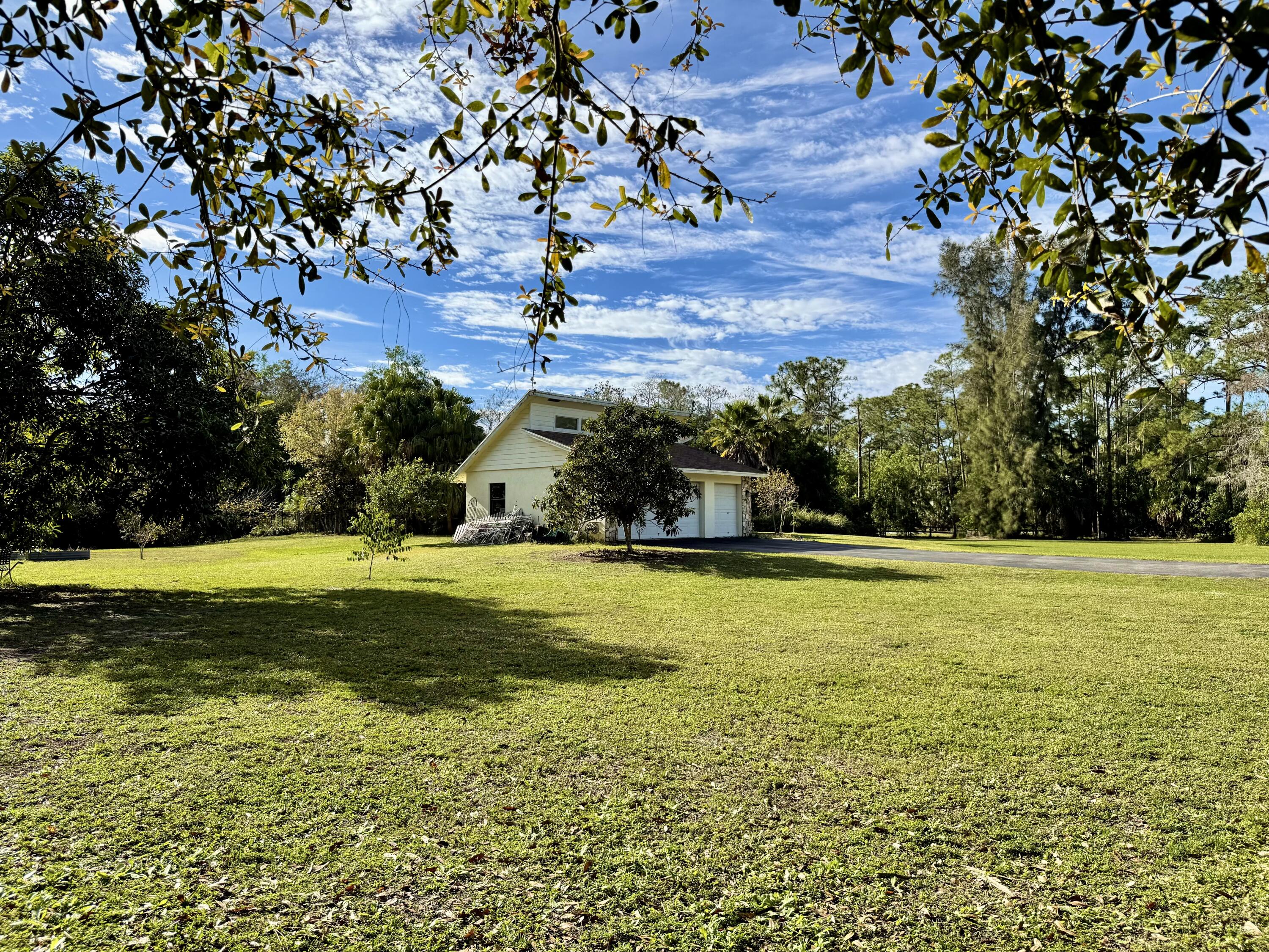 17375 173rd Road North Jupiter, FL 33478 - Photo 64 of 77 FRONT FAR