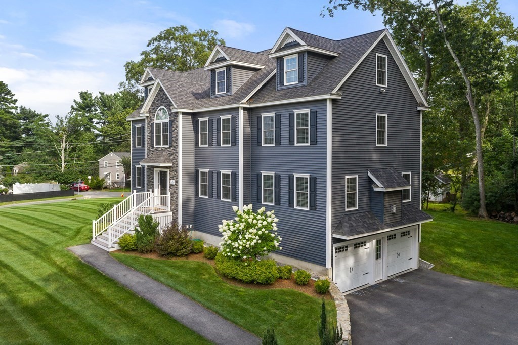 2 Georgianna Road Billerica, MA 01821 - Photo 1 of 41 a front view of a house with a yard