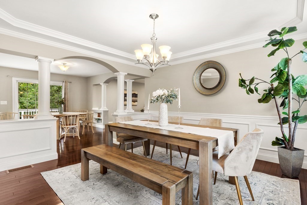 2 Georgianna Road Billerica, MA 01821 - Photo 12 of 41 a view of a dining room with furniture and a chandelier