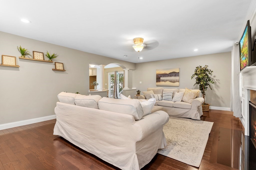 2 Georgianna Road Billerica, MA 01821 - Photo 15 of 41 a living room with furniture and a wooden floor