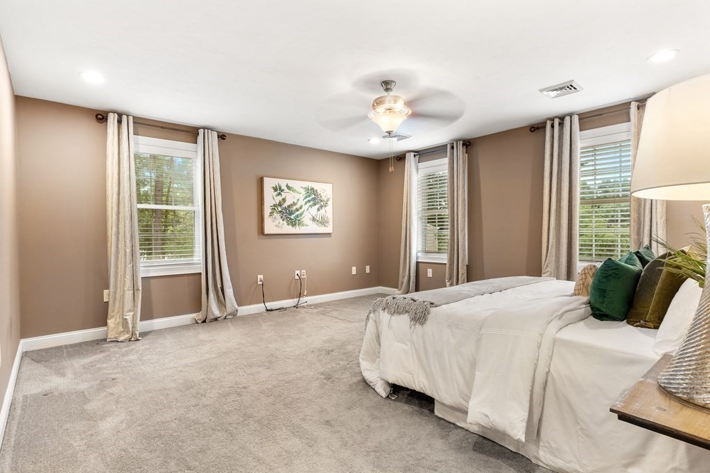 2 Georgianna Road Billerica, MA 01821 - Photo 21 of 41 a bedroom with a bed and a large window