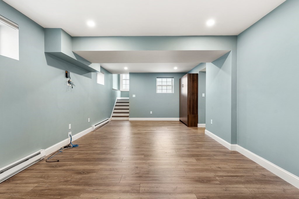 2 Georgianna Road Billerica, MA 01821 - Photo 33 of 41 a view of a room with wooden floors and stairs