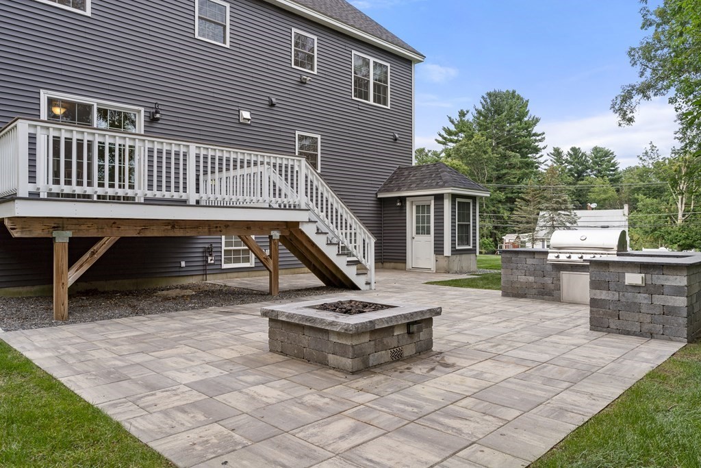 2 Georgianna Road Billerica, MA 01821 - Photo 38 of 41 a view of a house with backyard porch and sitting area