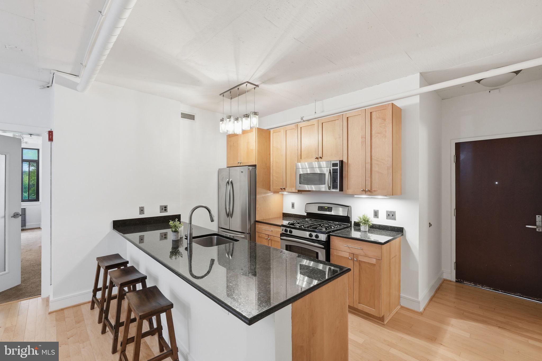 809 6th Street Northwest, Unit 22 Washington, DC 20001 - Photo 2 of 21 Roomy kitchen with extended island