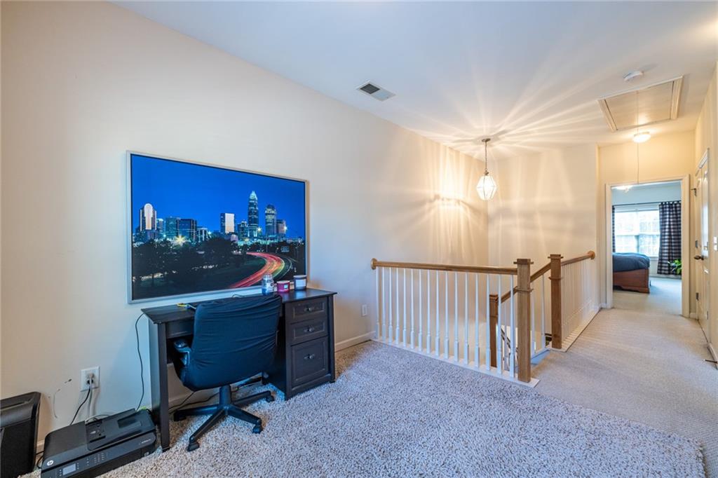 154 Trailside Way Hiram, GA 30141 - Photo 22 of 44 a view of a hallway with workspace and a window