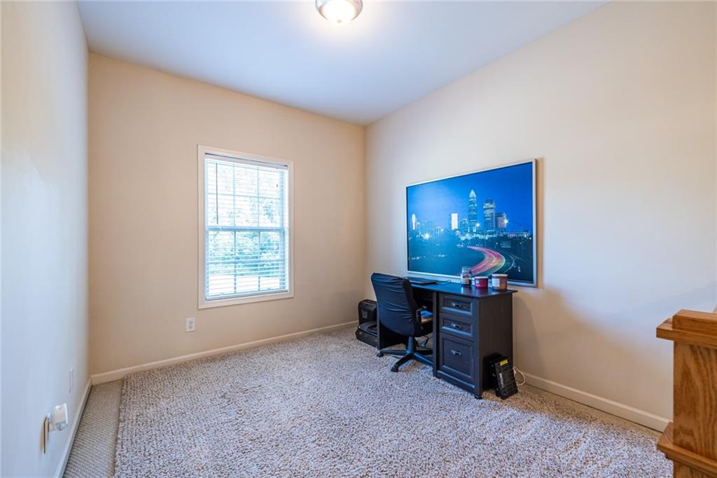 154 Trailside Way Hiram, GA 30141 - Photo 23 of 44 a view of a workspace with furniture and a window