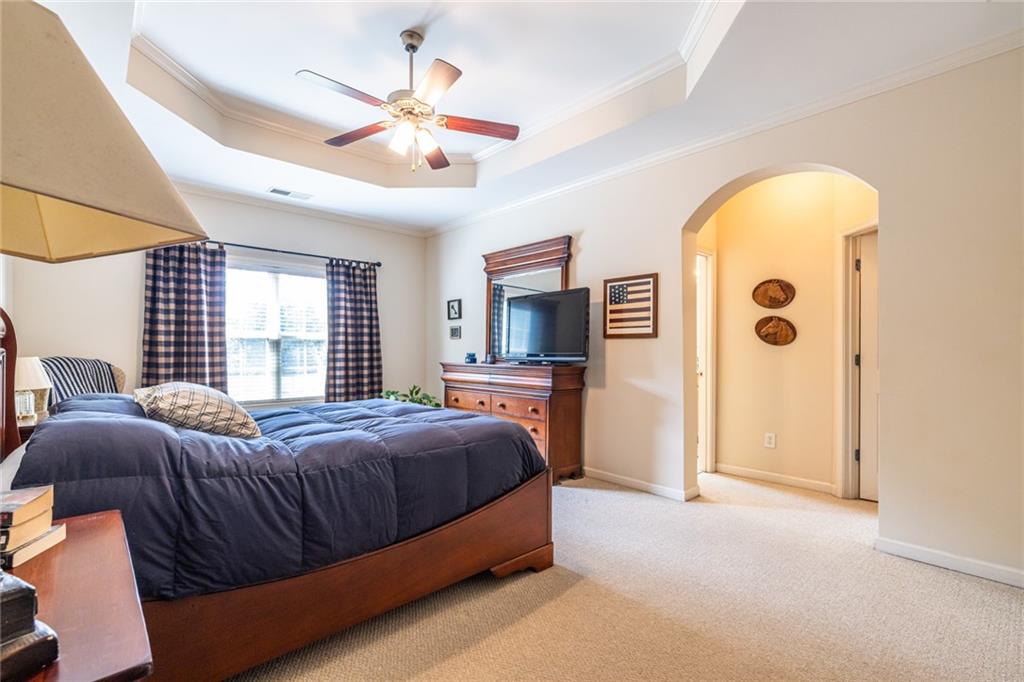 154 Trailside Way Hiram, GA 30141 - Photo 27 of 44 a living room with a bed furniture and a large window