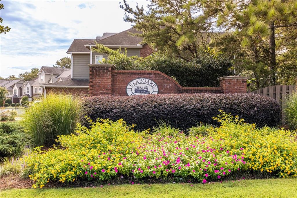 154 Trailside Way Hiram, GA 30141 - Photo 43 of 44 a front view of a house with a yard and fountain