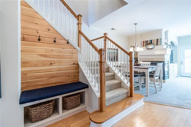 a view of entryway livingroom and hall with wooden floor