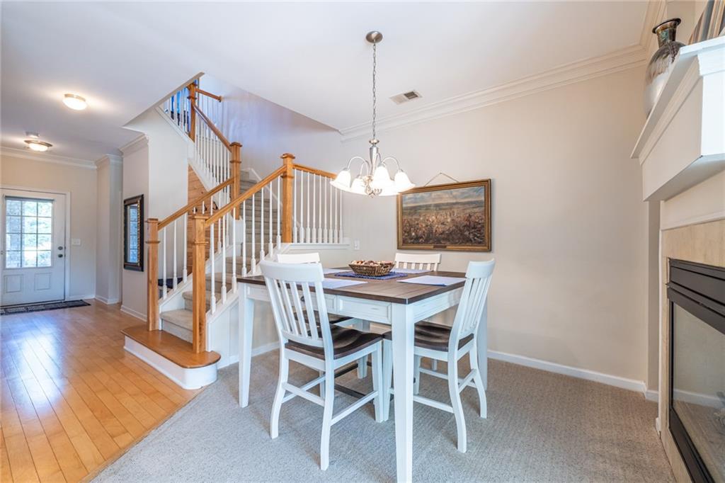154 Trailside Way Hiram, GA 30141 - Photo 9 of 44 a view of a dining room with furniture
