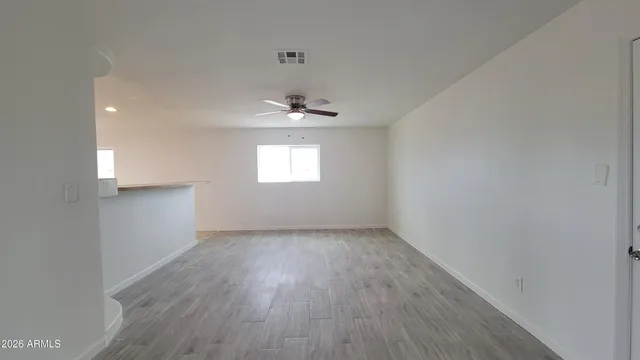 a view of a kitchen with electric appliances