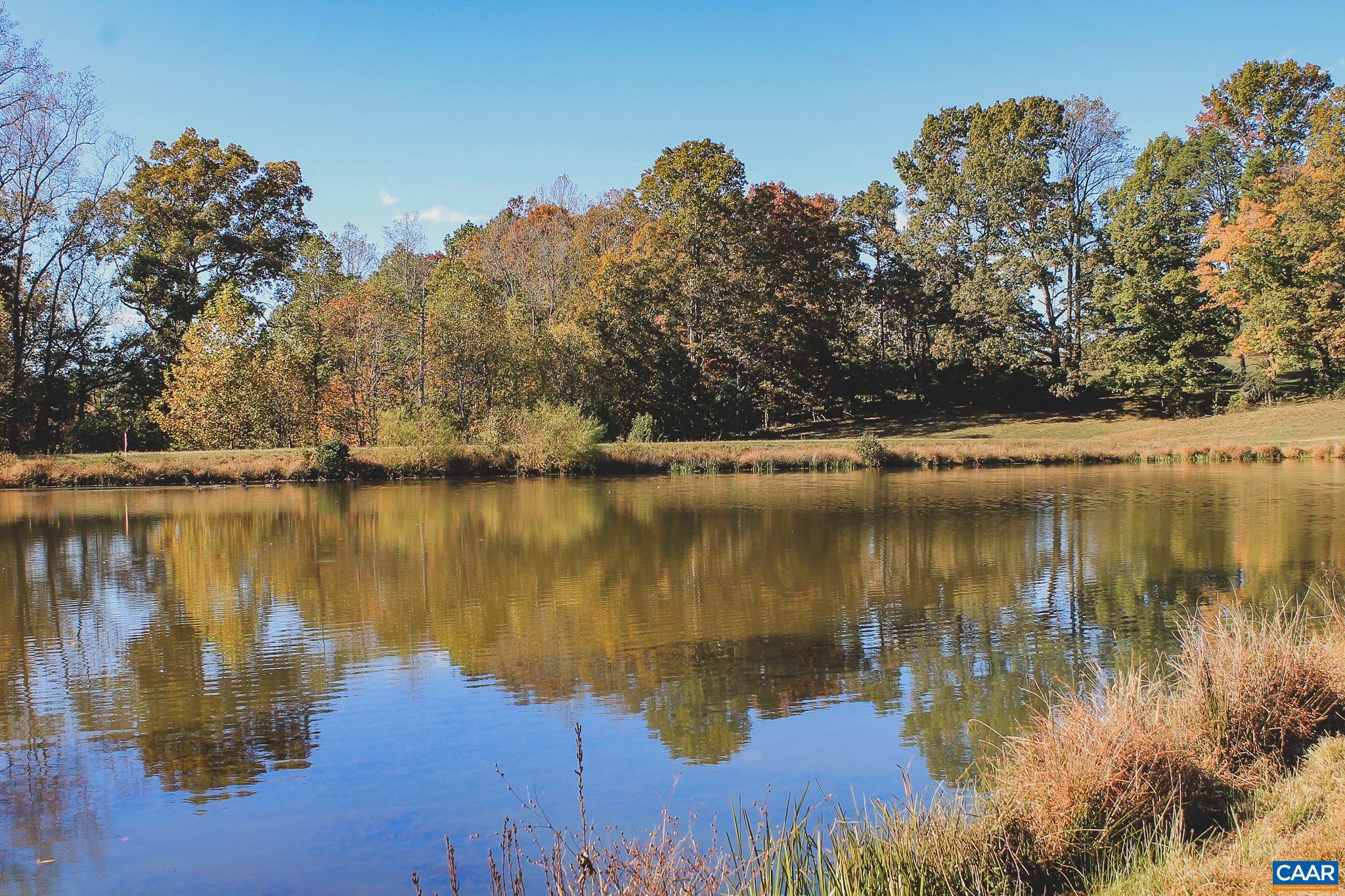 Tbd Rolling Road South, Unit 20 Scottsville, VA 24590 - Photo 23 of 28 a view of a lake in between two chairs