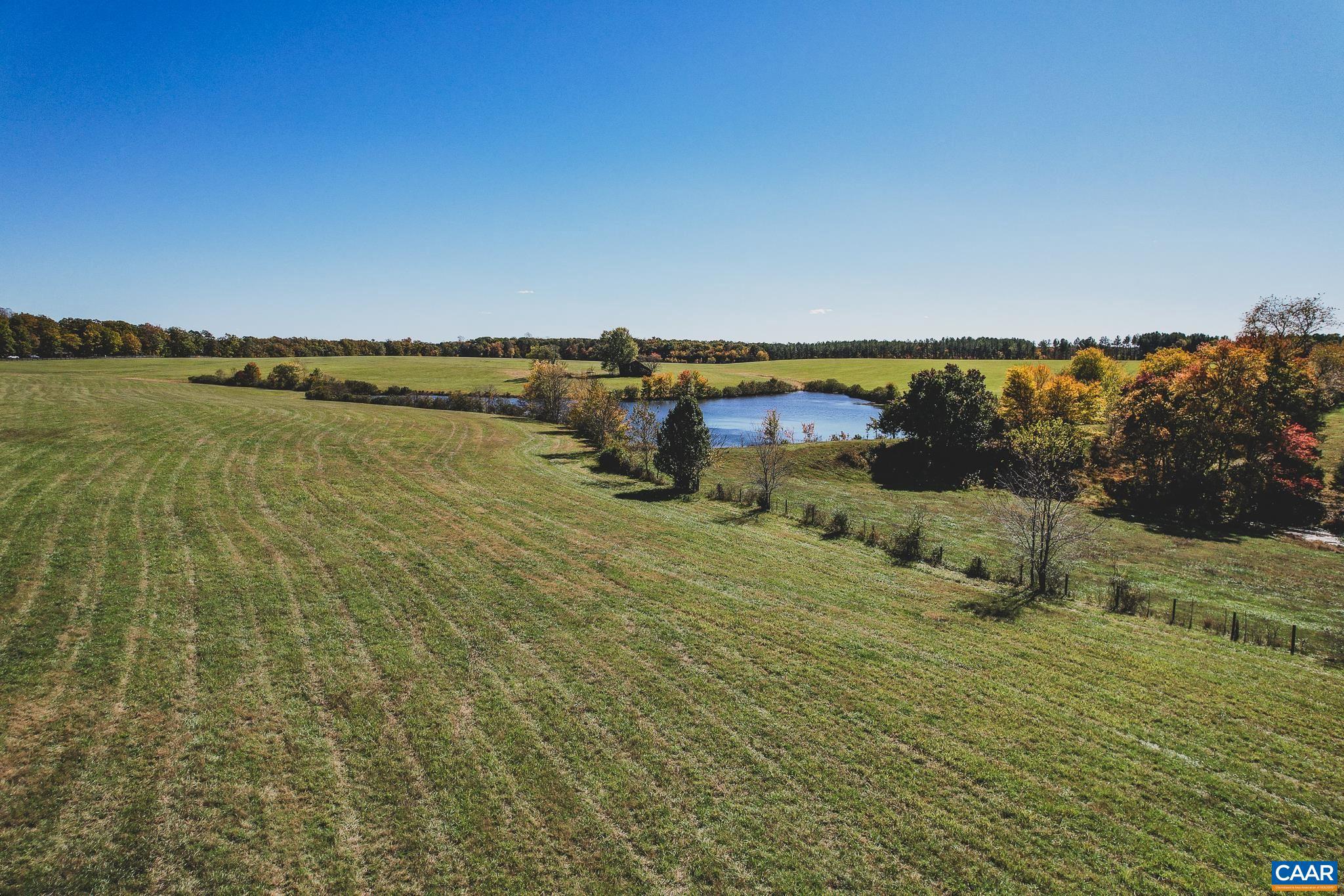 Tbd Rolling Road South, Unit 20 Scottsville, VA 24590 - Photo 8 of 28 a view of a lake and mountain in the back