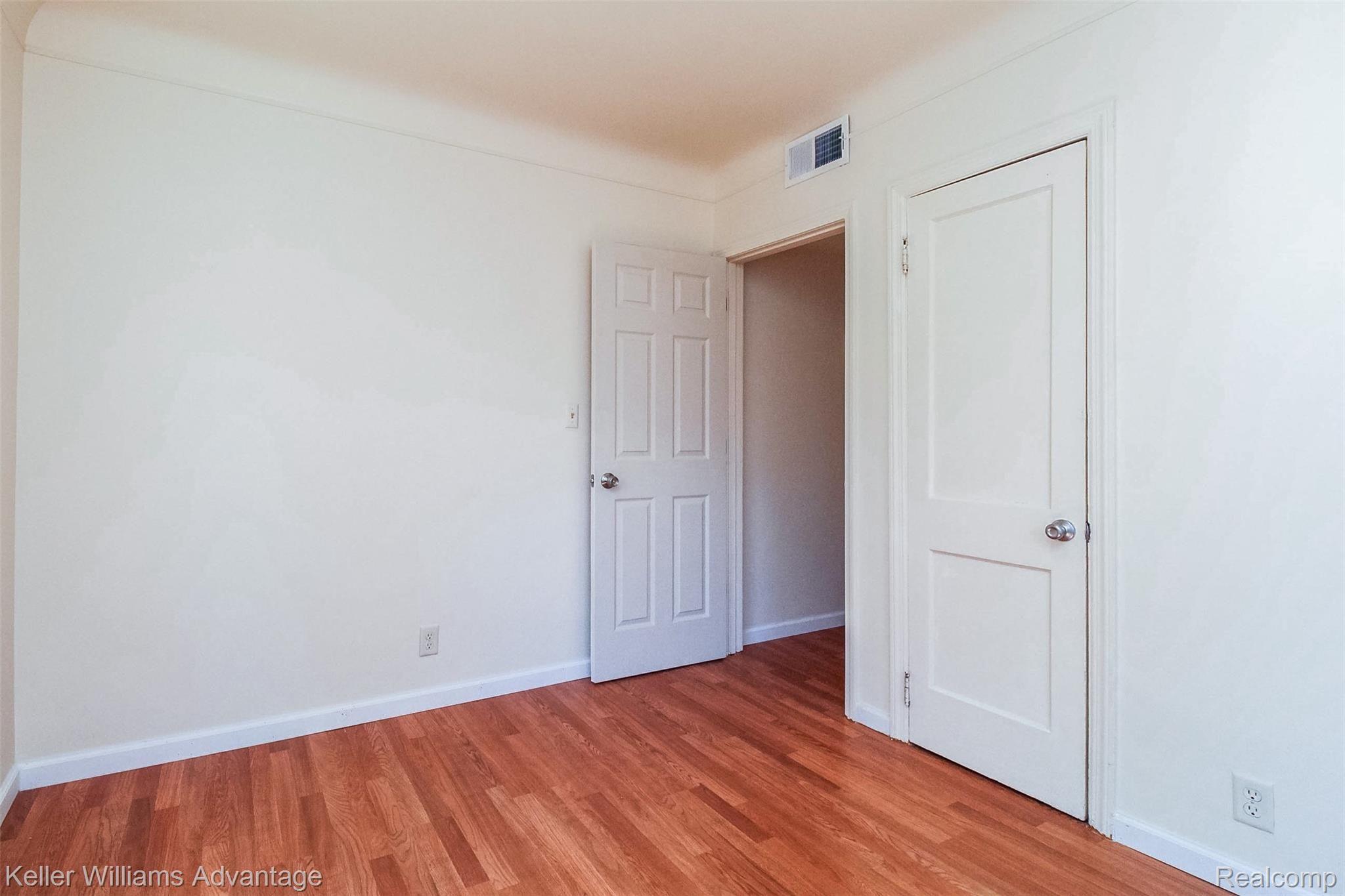 29661 Five Mile Road Livonia, MI 48154 - Photo 13 of 26 Bedroom with new flooring & fresh paint