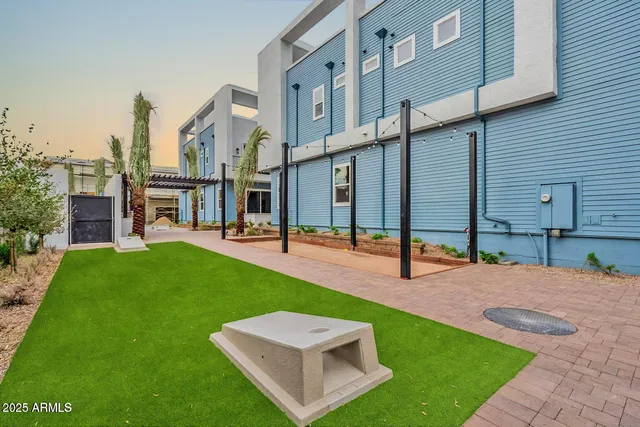 a view of outdoor space yard deck patio and fire pit