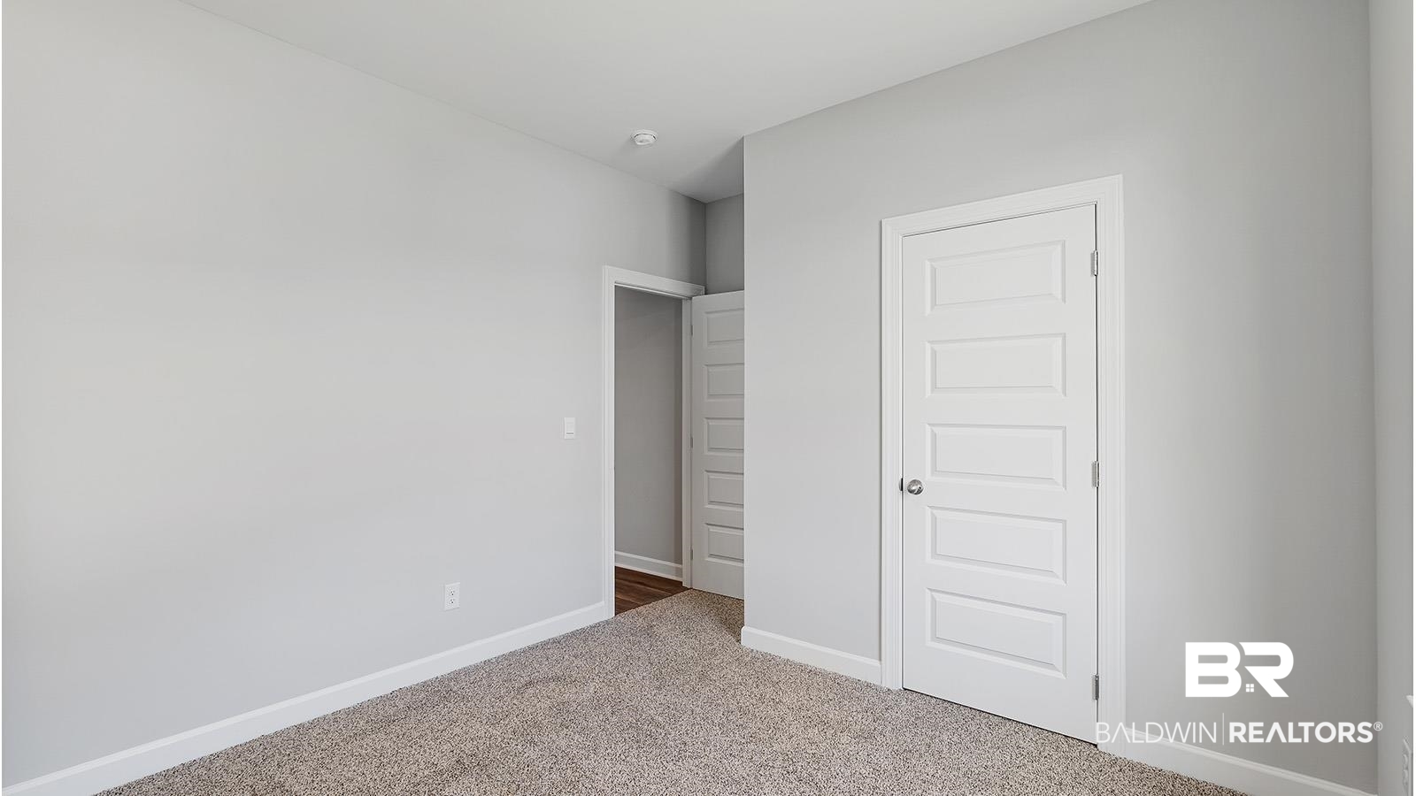 30567 Asheville Road Daphne, AL 36527 - Photo 27 of 29 Unfurnished bedroom featuring carpet floors and a closet