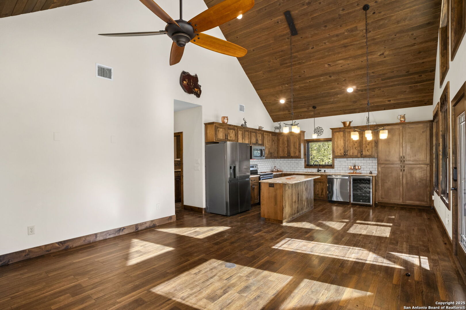 3615 Riverside Drive Kerrville, TX 78028 - Photo 11 of 50 a kitchen with a refrigerator and a stove