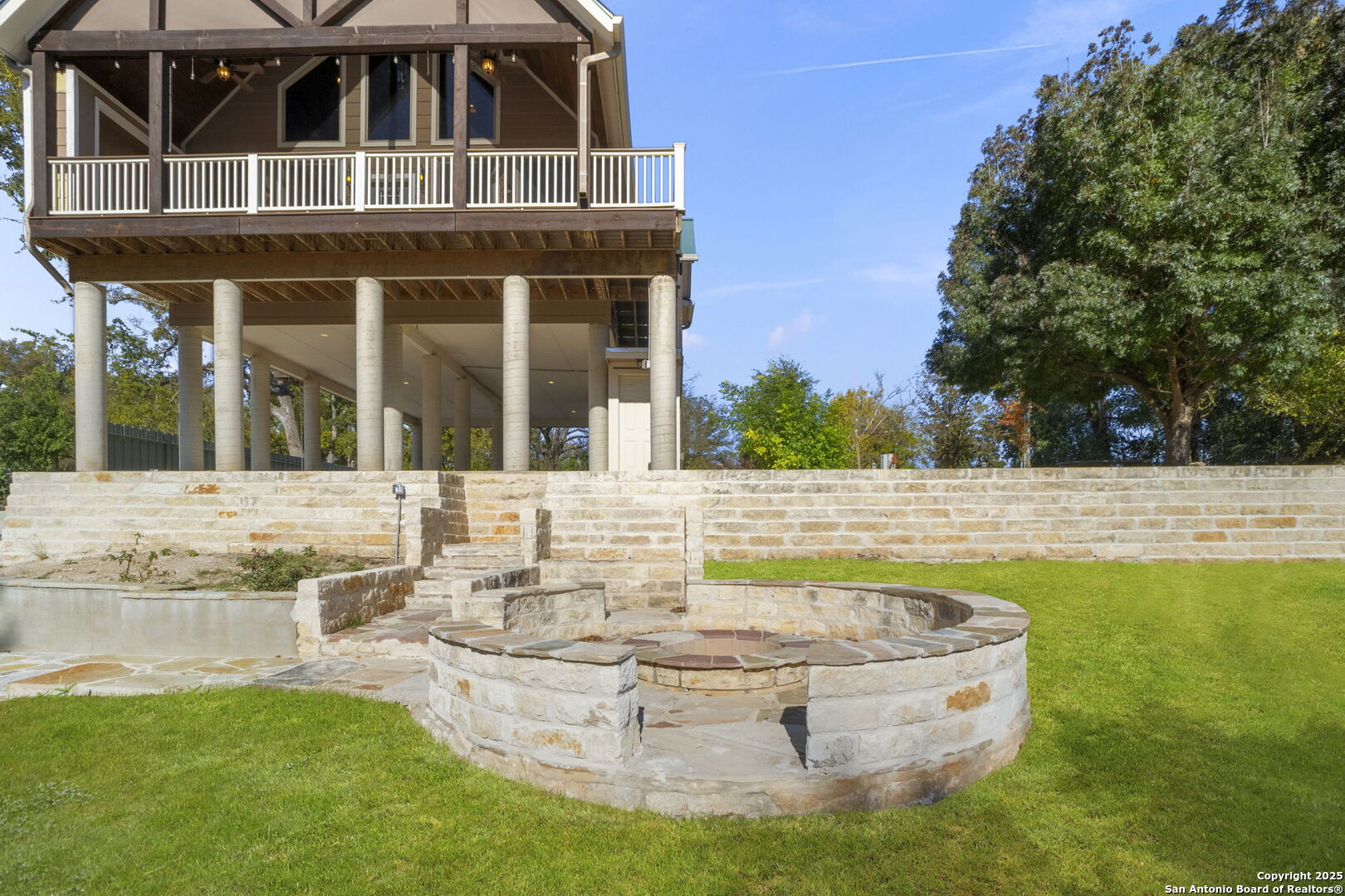 3615 Riverside Drive Kerrville, TX 78028 - Photo 42 of 50 a view of a house with swimming pool and a yard