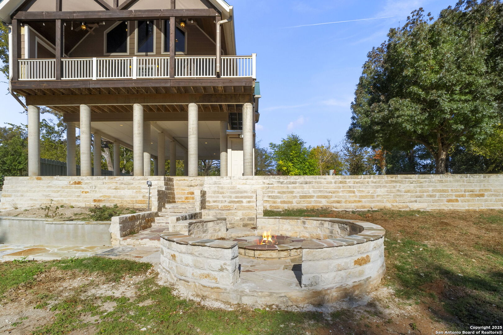 3615 Riverside Drive Kerrville, TX 78028 - Photo 44 of 50 a view of a white building with swimming pool in front of it