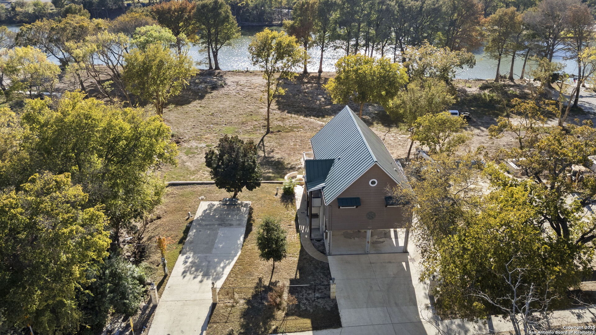 3615 Riverside Drive Kerrville, TX 78028 - Photo 46 of 50 a view of a house with a yard