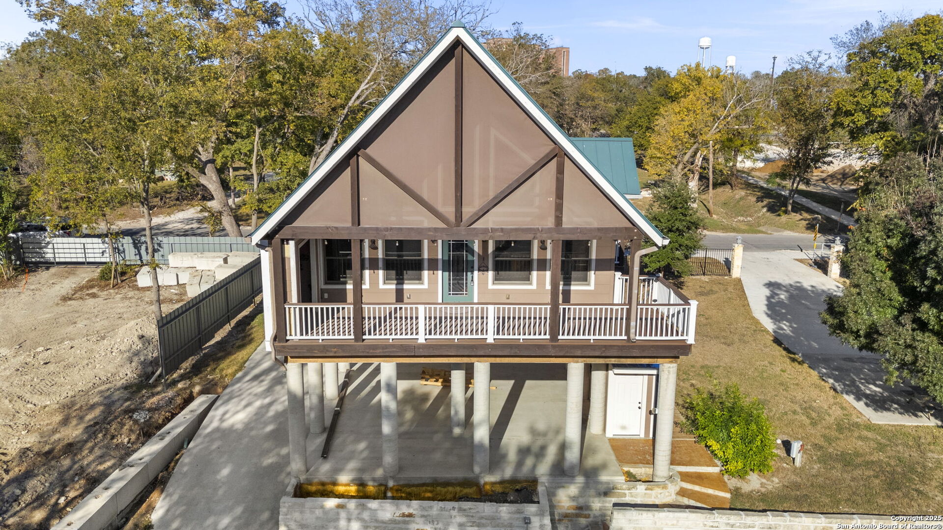 3615 Riverside Drive Kerrville, TX 78028 - Photo 49 of 50 a view of house with a swimming pool