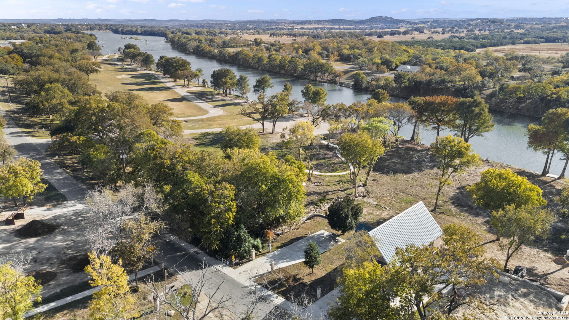 3615 Riverside Drive Kerrville, TX 78028 - Photo 5 of 50 an aerial view of residential houses with outdoor space
