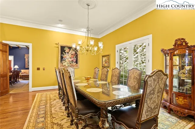 a view of a living room with bathroom