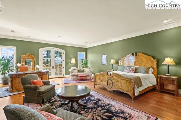 a view of a two chairs in a backyard