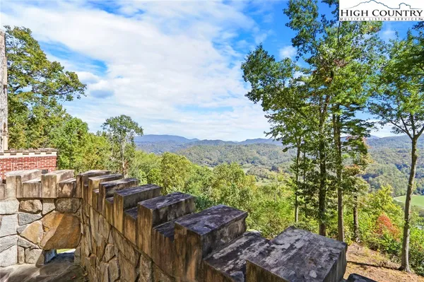 a bedroom with a bed and a mirror