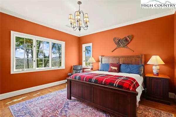 a bathroom with a sink a toilet and a shower