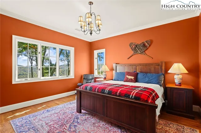 a bathroom with a sink a toilet and a shower