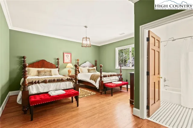 a bathroom with a sink a window and a mirror