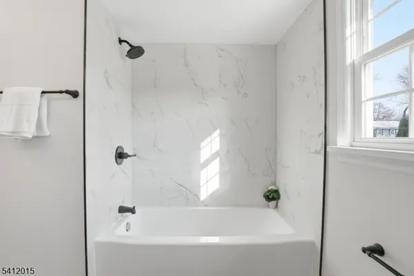 a bathroom with a bathtub