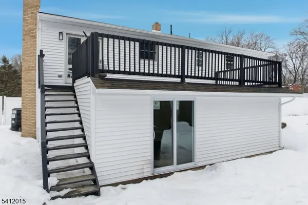 a view of a house with a deck