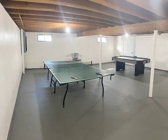 a room with furniture and window