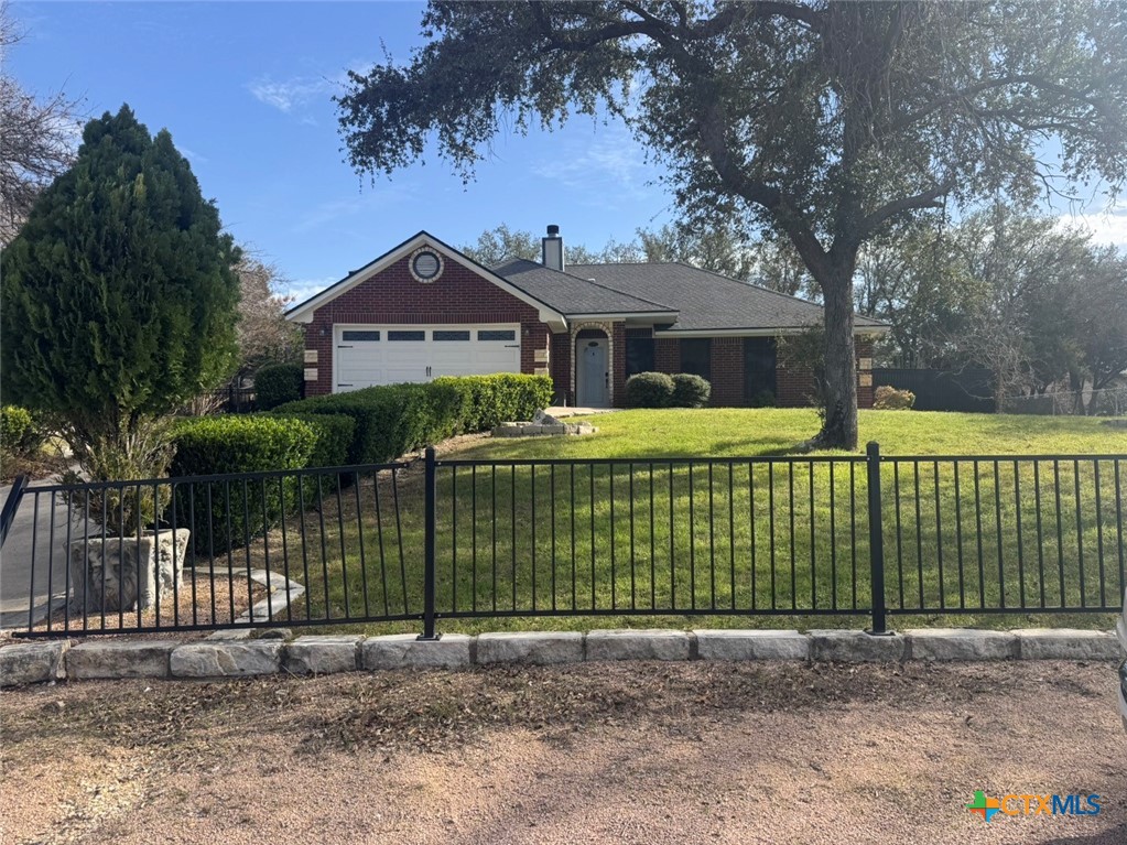 5524 Denmans Mountain Road Belton, TX 76513 - Photo 1 of 15 a front view of a house with a garden