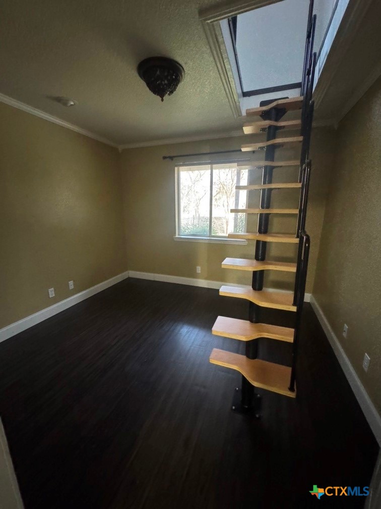 5524 Denmans Mountain Road Belton, TX 76513 - Photo 13 of 15 a view of entryway and hall with wooden floor