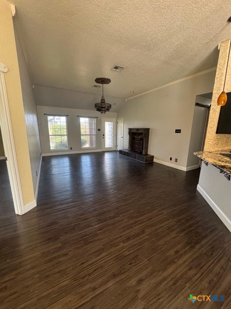 5524 Denmans Mountain Road Belton, TX 76513 - Photo 8 of 15 a view of empty room with wooden floor